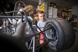 UNH Formula One SAE car and student