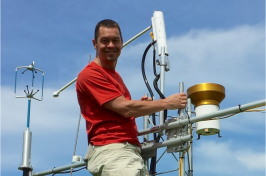 Researcher Scott Ollinger on a research tower