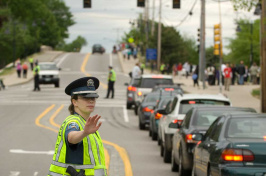 An officer directing traffic at UNH
