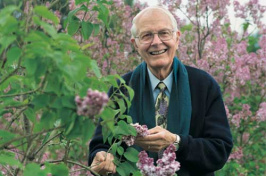 UNH emeritus professor of plant biology Owen Rogers among lilacs