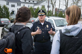 UNH police chief Paul Dean talking with students