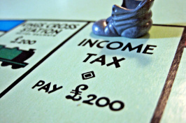 image of "income tax" stop on Monopoly board