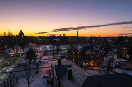 aerial view of UNH's Durham campus at sunset during winter