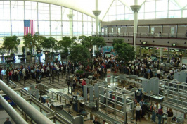 airport security line, photo by KITT HODSDEN; WIKIMEDIA COMMONS