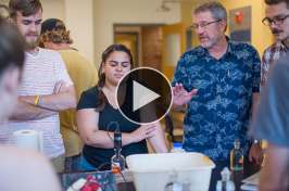 UNH professor William McDowell with students