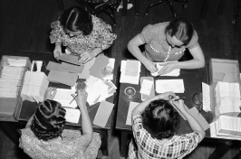 In this historic photo from the Library of Congress, workers in the Social Security Board Records Office check for any errors in their files.