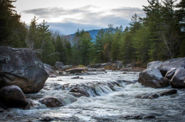 a river with Mt. Katahdin in the background (ARAM BOGHOSIAN FOR THE BOSTON GLOBE)