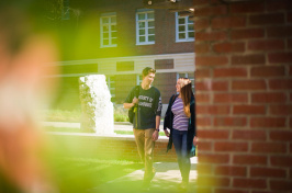 UNH students walking on campus fall 2017