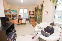 UNH students working in their dorm room