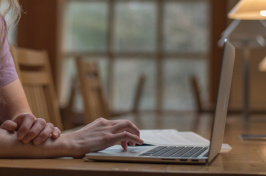 fingers on laptop