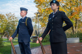 Two UNH ROTC students holding vigil at flag at Thompson Hall