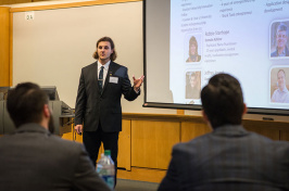 a UNH student presents to judges during the Paul J. Holloway Innovation to Market Competition Challenge Round