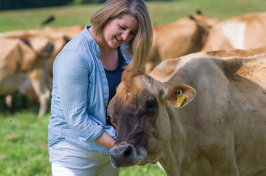 Kristin Duisberg visiting some cows at the UNH organic dairy