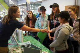 Kate Guerdat working with children in the 4-H program