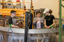 UNH Professor Nancy Kinner working with students. 