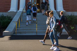 UNH students walking in front of Hamilton Smith Hall
