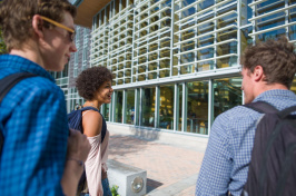 UNH students walking toward the Peter T. Paul College of Business and Economics