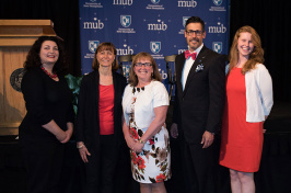 UNH 2017 Presidential Award of Excellence recipients Carla Cannizzaro, Amanda Stone, Marlene Brooks and Avary Thorne, pictured with Chris Clement, vice president for finance and administration