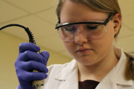 Student Rachel Main is shown in the biotech lab at Great Bay Community College. 