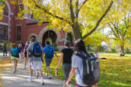 UNH students walking by Thompson Hall