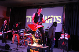 The Slants on stage at a show