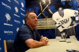 UNH men's hockey coach Dick Umile speaks at a press conference during September's media day in Durham. (DAVID LANE/UNION LEADER FILE)
