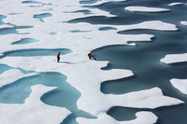 Two members of NASA’s ICESCAPE mission, a shipborne investigation researching how changing Arctic conditions affect the ocean’s chemistry and ecosystems. (Photo: NASA/Kathryn Hansen, Flickr CC BY 2.0)