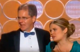 Chris Buck and Jennifer Lee accepting  the Golden Globe