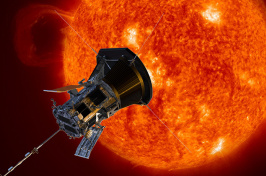 A silver octagonal probe approaches the red-hot surface of the sun.