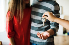 image of people holding keys