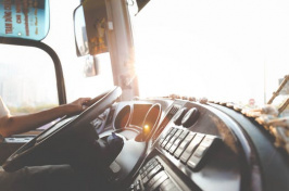 image of person driving bus, pexels.com image