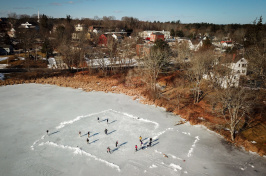 UNH students skating on the Mill Pond