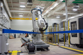 A robot at work in UNH's John Olson Advanced Manufacturing Center