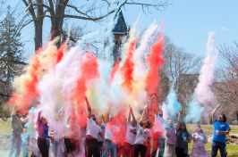 Holi chalk toss in front of Thompson Hall at UNH