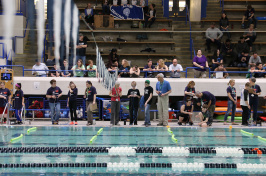 Middle school students driving robots at University of New Hampshire pool during SeaPerch event