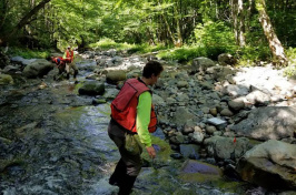 Chad Hammer and team survey river banks.