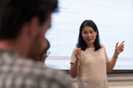 A UNH Manchester professor in a classroom 