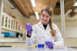 UNH's Lizz Maurais '19 in a lab 