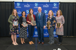  Winners of the 2019 staff excellence awards with President James Dean