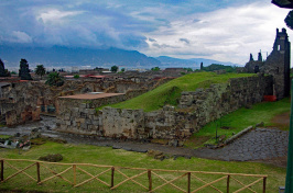 Ruins of the Vesuvius gate with the remains of a tower on the right.