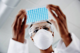 Female scientist works on a vaccine for COVID-19