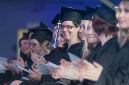 Students clapping at UNHM commencement