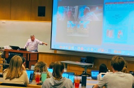 Rick Kilbride speaks to his financial scandals class at UNH.