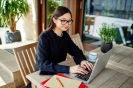 Woman working on computer at a table