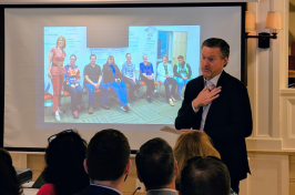 Rod Harl, chairman of Alene Candles, speaks at a recent CEO Speaker Series meeting at the Three Chimneys Inn in Durham.