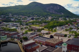 aerial view of Berlin, New Hampshire, with mountains visible in the backdrop