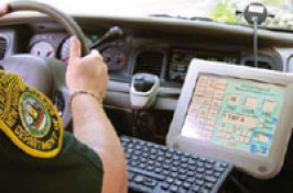 a person behind the wheel of a car