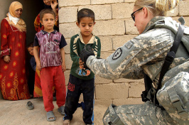 soldier greeting children