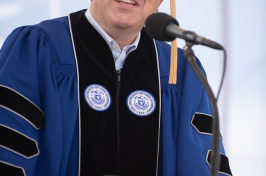 Shawn Gorman, executive chairman of the board of LL Bean, speaking at UNH commencement