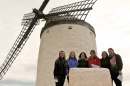 students in spain in front of windmill
